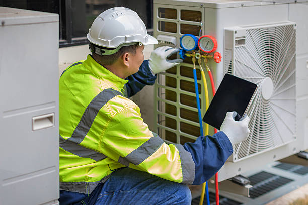 Professional Hvac technician working in Patterson, NC